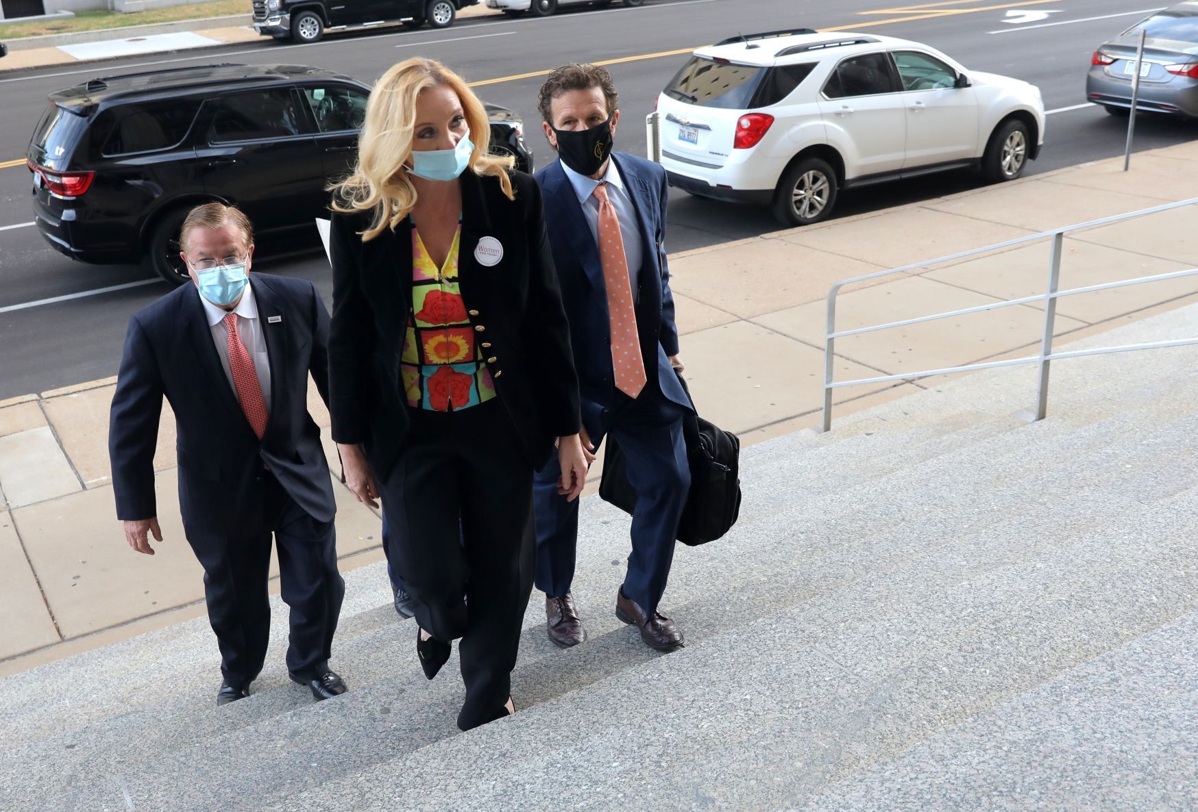 Mark and Patricia McCloskey arrive for arraignment hearing